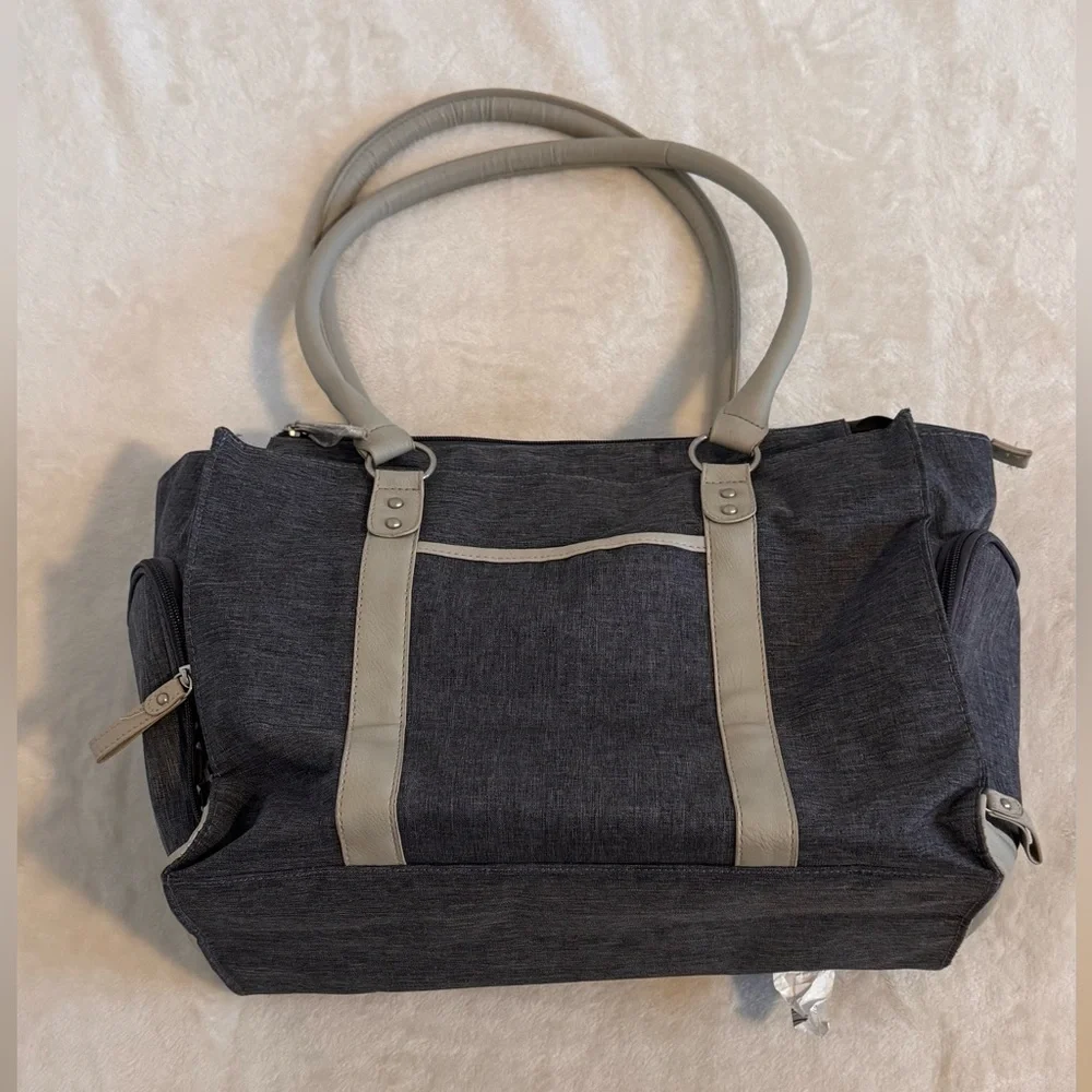 Bananafish Diaper Bag.  New Condition/ Never used.  Light navy and taupe/tan.